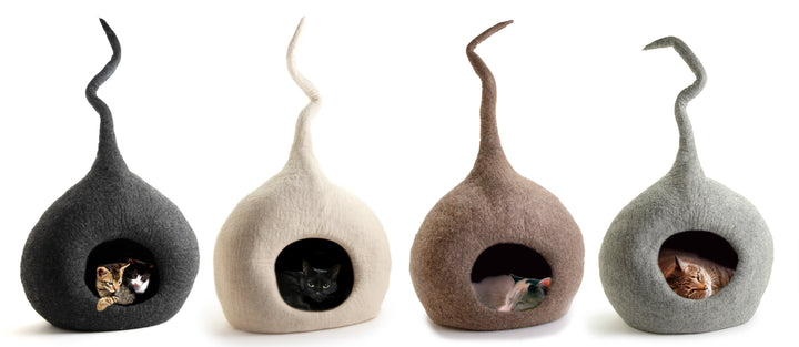 Four wool cat caves with cats inside, shown in light grey, brown, white, and dark grey, handmade eco-friendly cat beds