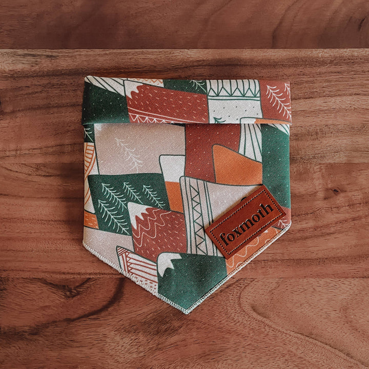 Handmade earth-tone Cozy Mountains dog bandana with snap closure