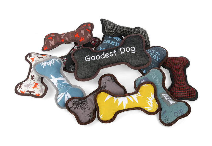 Collection of ECO P.L.A.Y. Bone squeaky dog toys in multiple colors, eco-friendly recycled pet supplies
