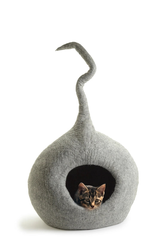 Cat resting in a handmade light grey wool cat cave bed by CBC Pet, eco-friendly cat supplies