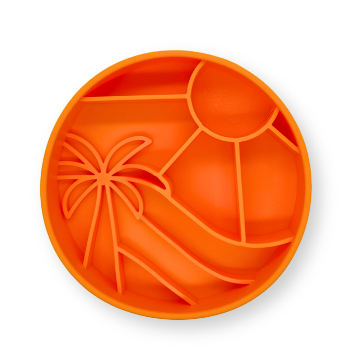 Orange Loco Coco Interactive Slow Feeder Dog Bowl made from BPA-free silicone with suction cups.