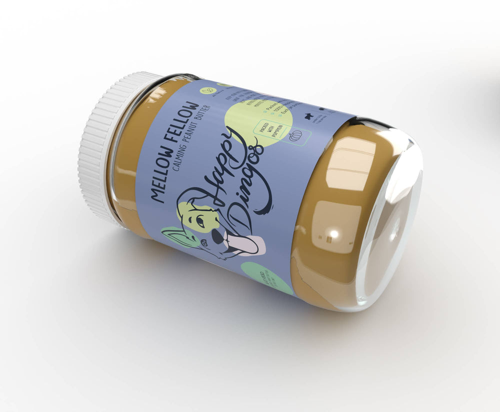 16oz jar of Mellow Fellow Calming Peanut Butter for dogs shown on its side, all-natural calming treat made in the USA.