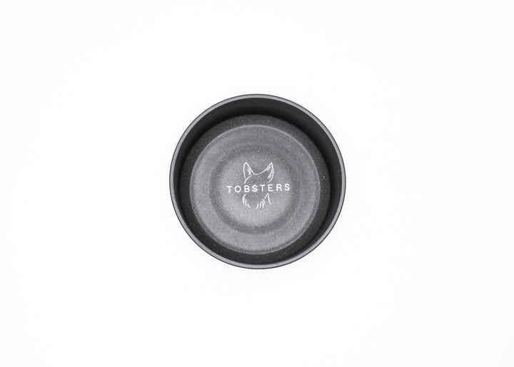 Black bowl with 'Tobsters' logo on a white background