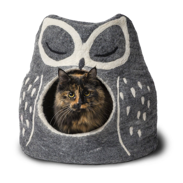 Grey owl pet cave with cat inside it